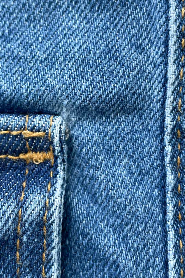 Сорочка джинсова синя з бахромою на кишенях 1