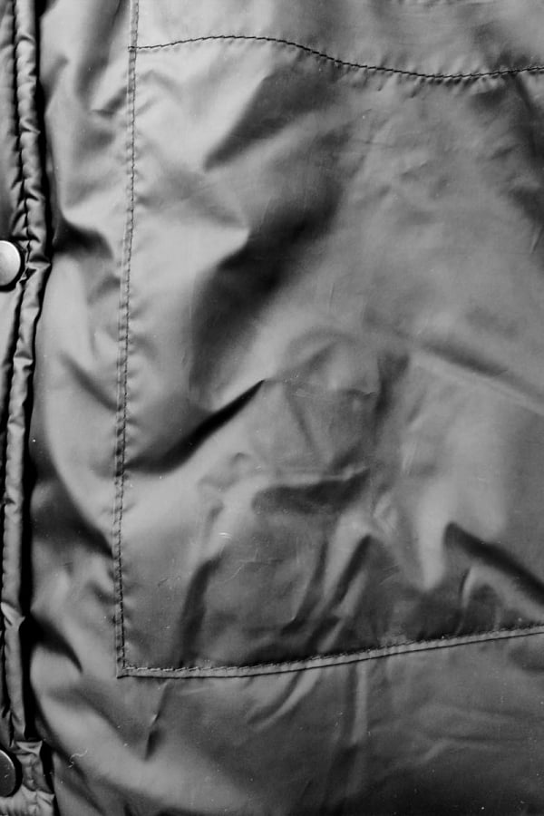 Куртка-пуховик oversize чорного кольору з капюшоном 1