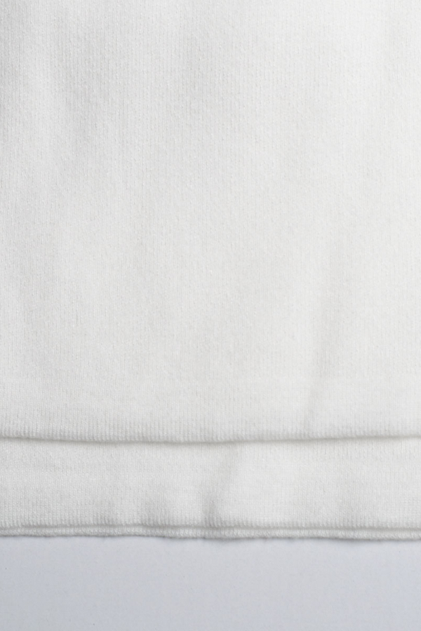 Штани білого кольору з в'язаного трикотажу 1