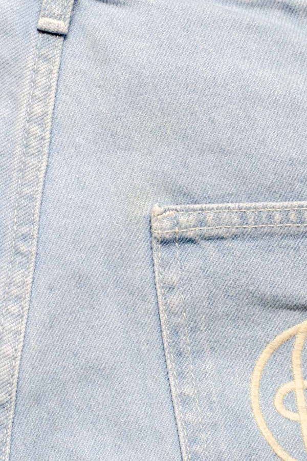 Джинси палаццо блакитні з вишивкою на кишенях 1