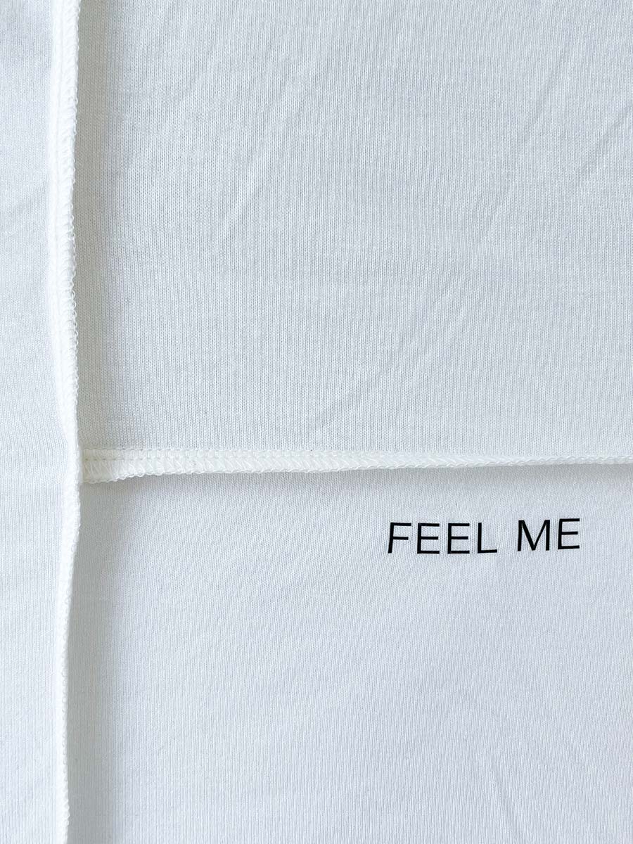 Гольф молочного кольору з відстрочками та принтом FEEL ME 3