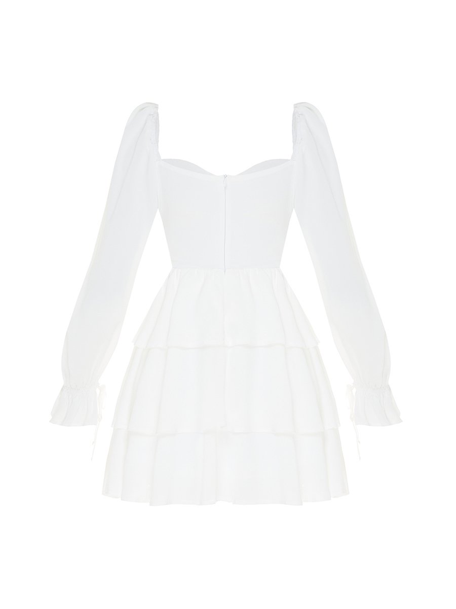 Сукня міні білого кольору корсетна з рюшем 9