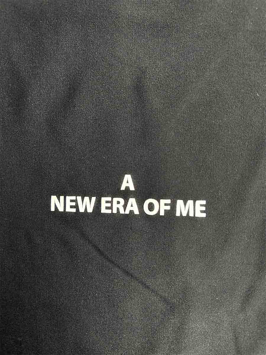 Лосини чорні з принтом NEW ERA OF ME 1