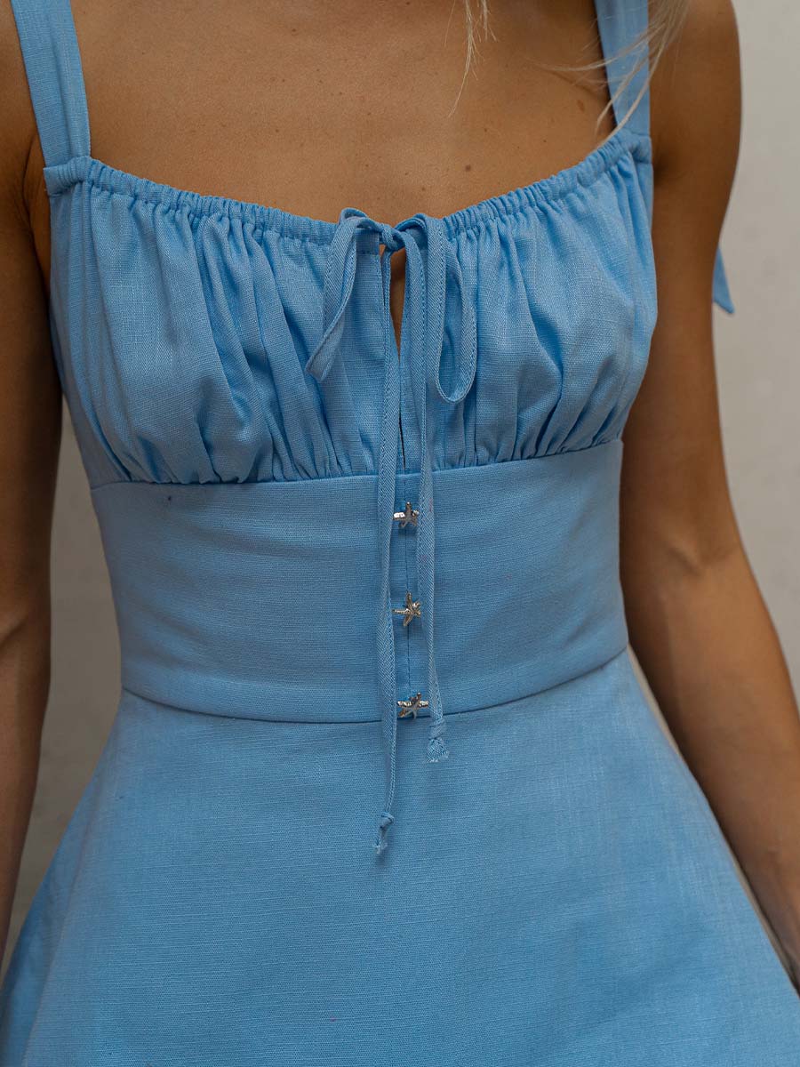 Сукня міні лляна блакитного кольору з фігурним низом 8