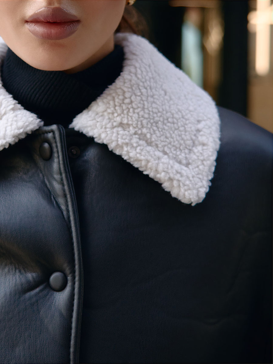 Дублянка чорного кольору з хутром коміром 8