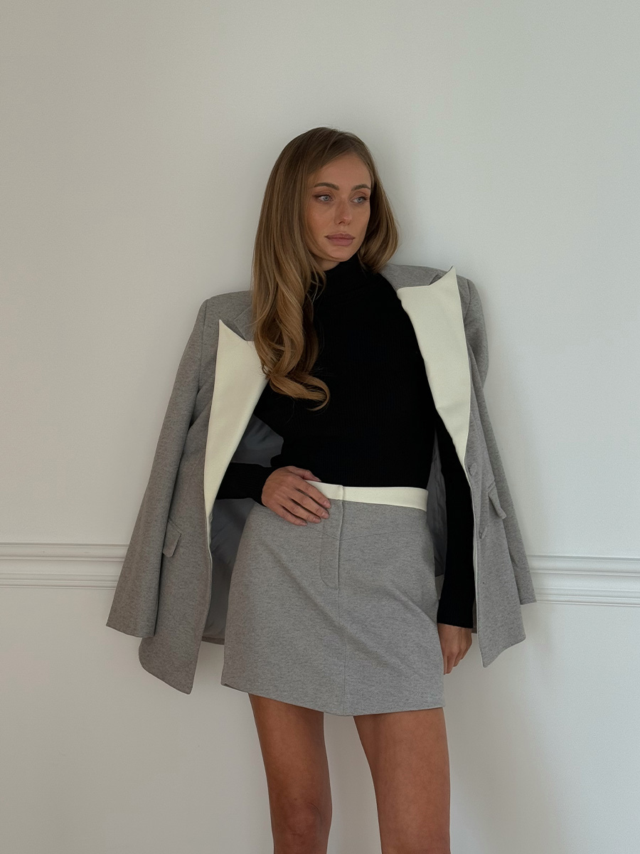 Спідниця-міні сірого кольору з трикутним низом 1