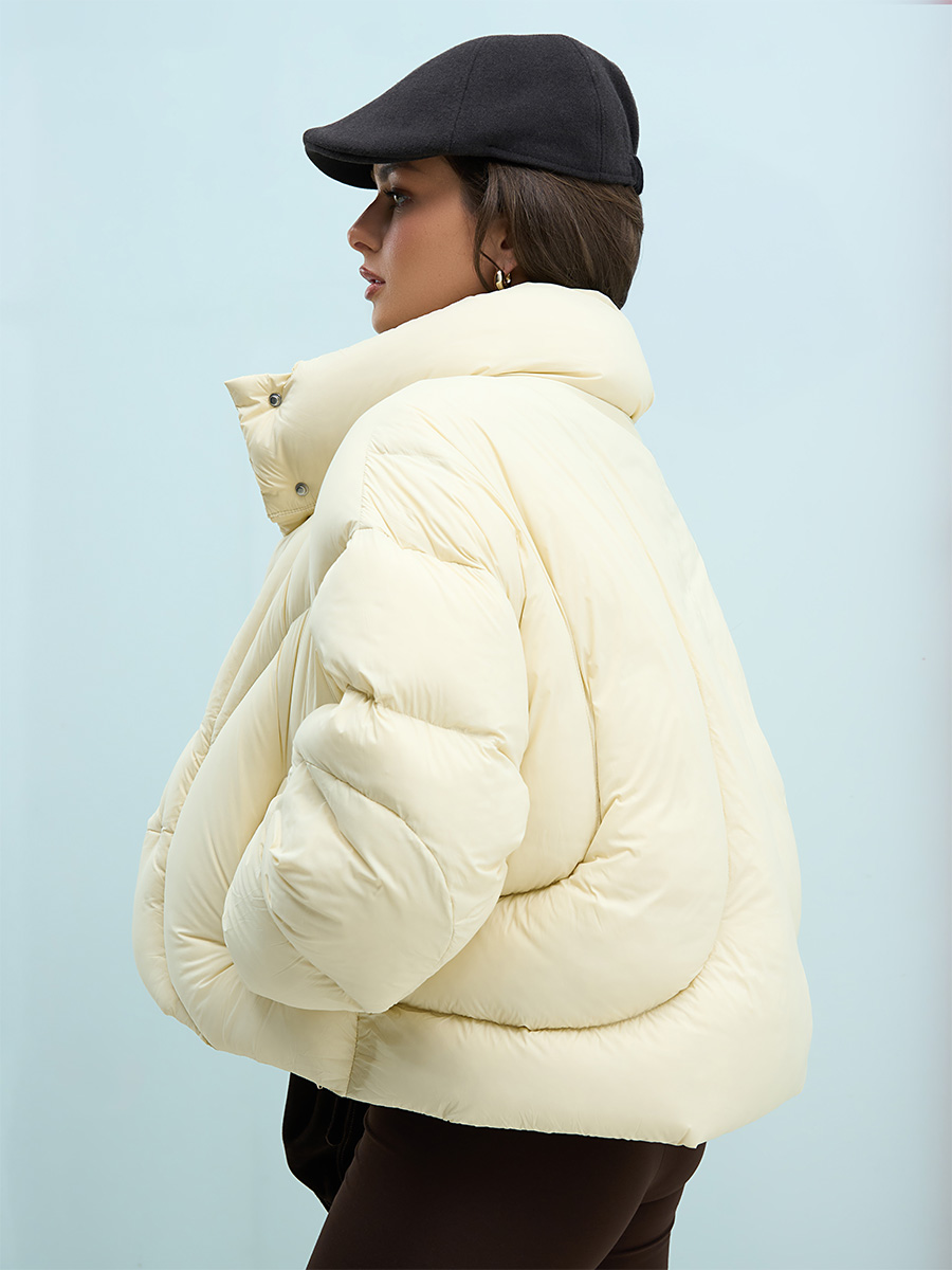 Пуховик оверсайз світло-жовтого кольору вкорочений з коміром стійка 1