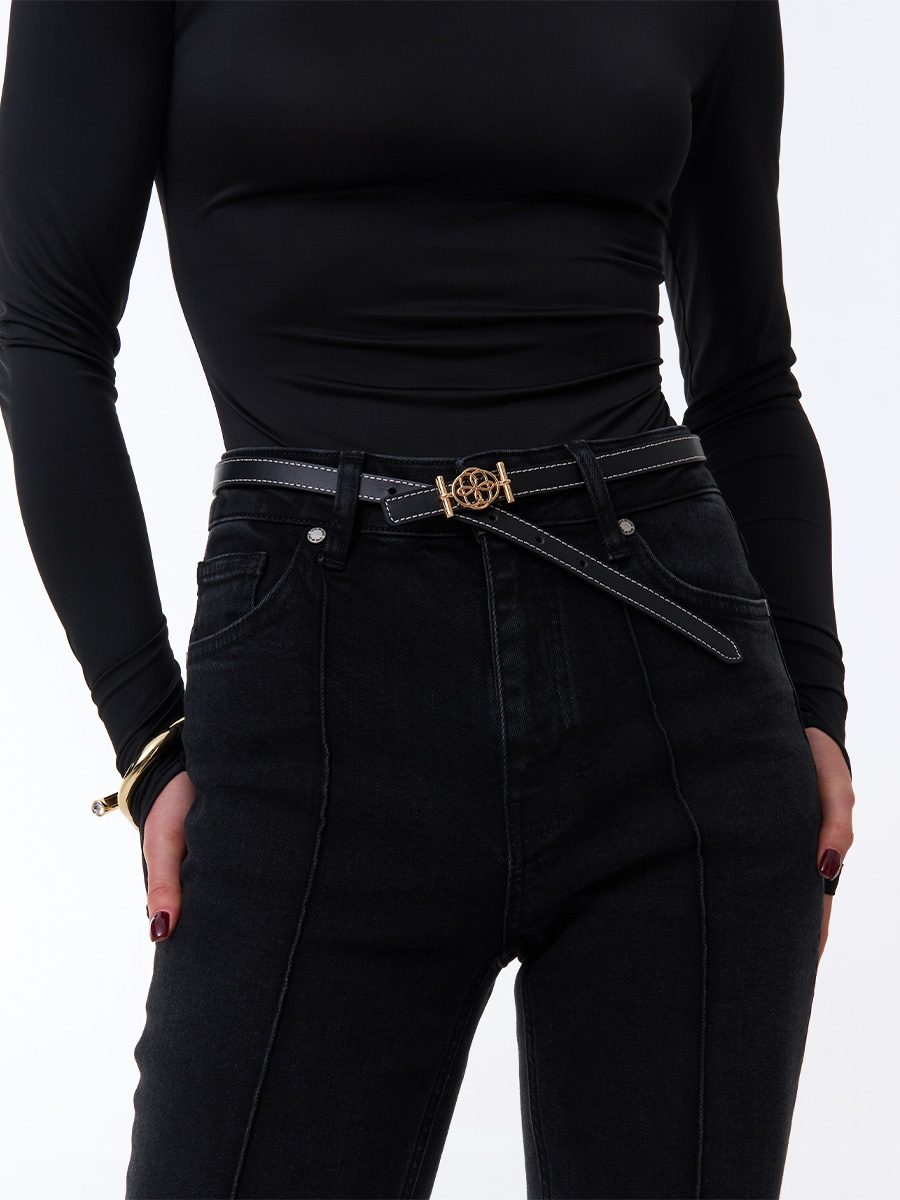 Джинси кльош чорного кольору з вертикальними відстрочками 1