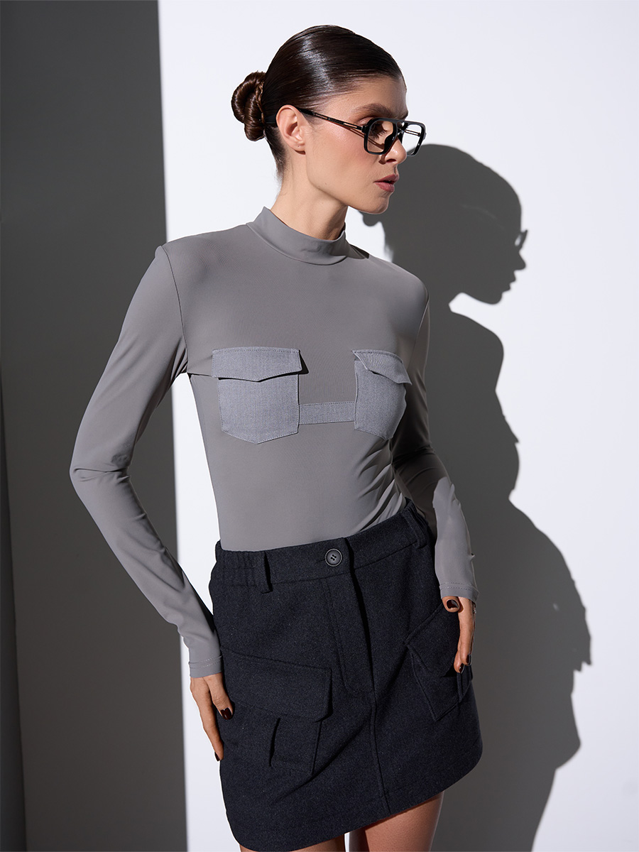 Спідниця міні сірого кольору з об'ємними кишенями 1