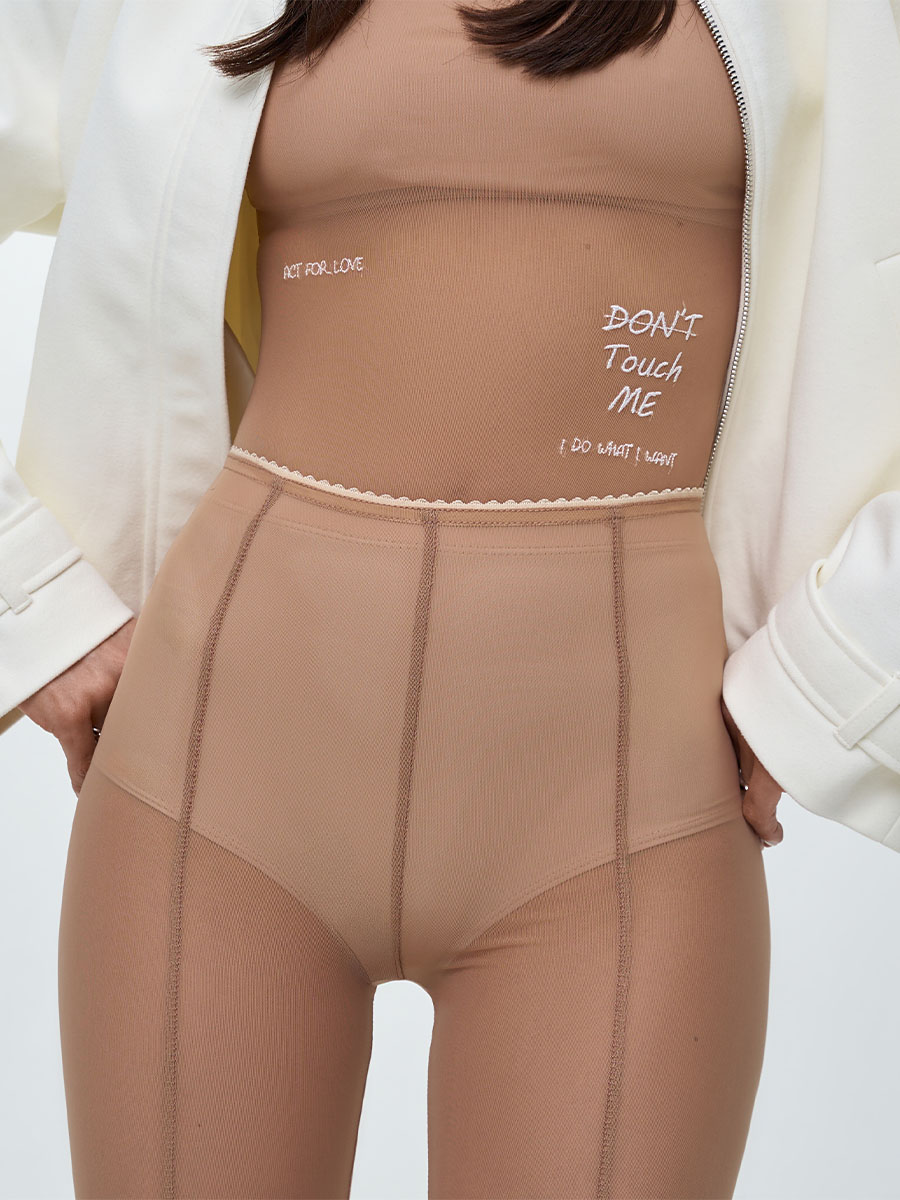 Легінси бежевого кольору з сітки зі штрипками 1