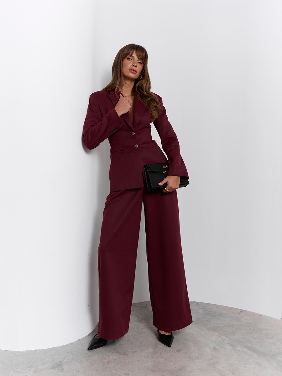Штани бордового кольору зі скісними шльовками 1