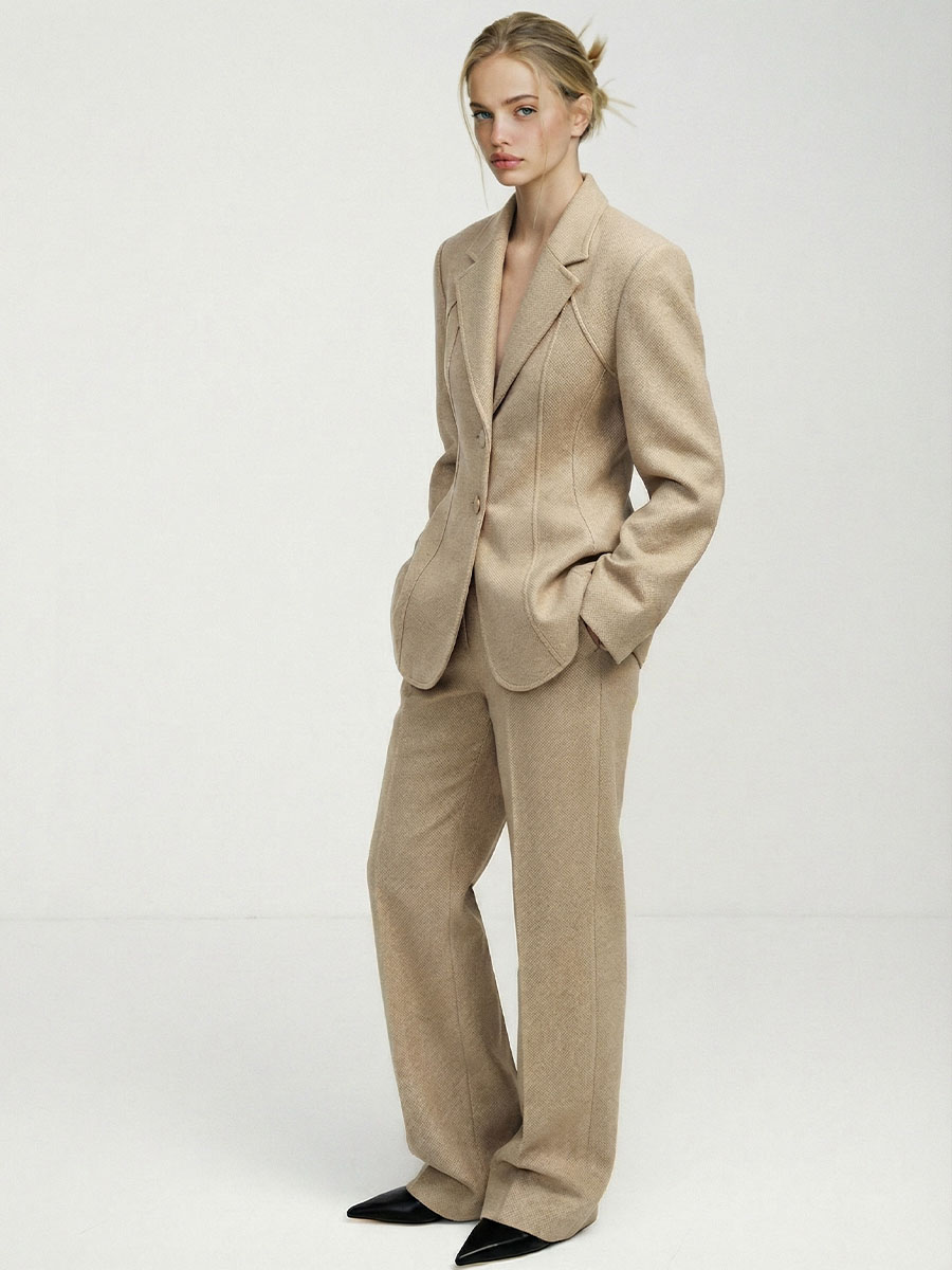 Штани завужені бежевого кольору середньої посадки 1