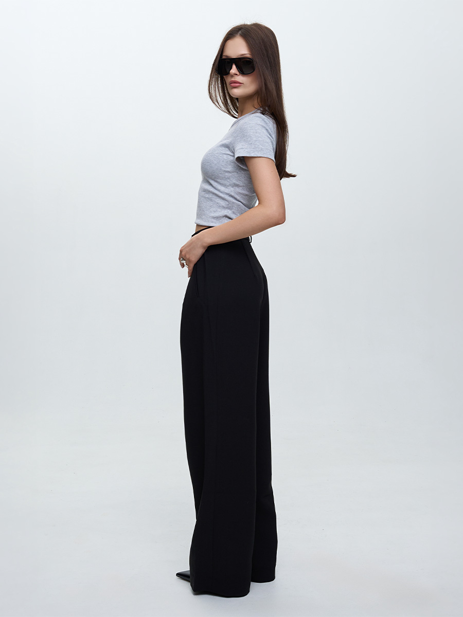 Штани-палаццо чорного кольору зі складами 1