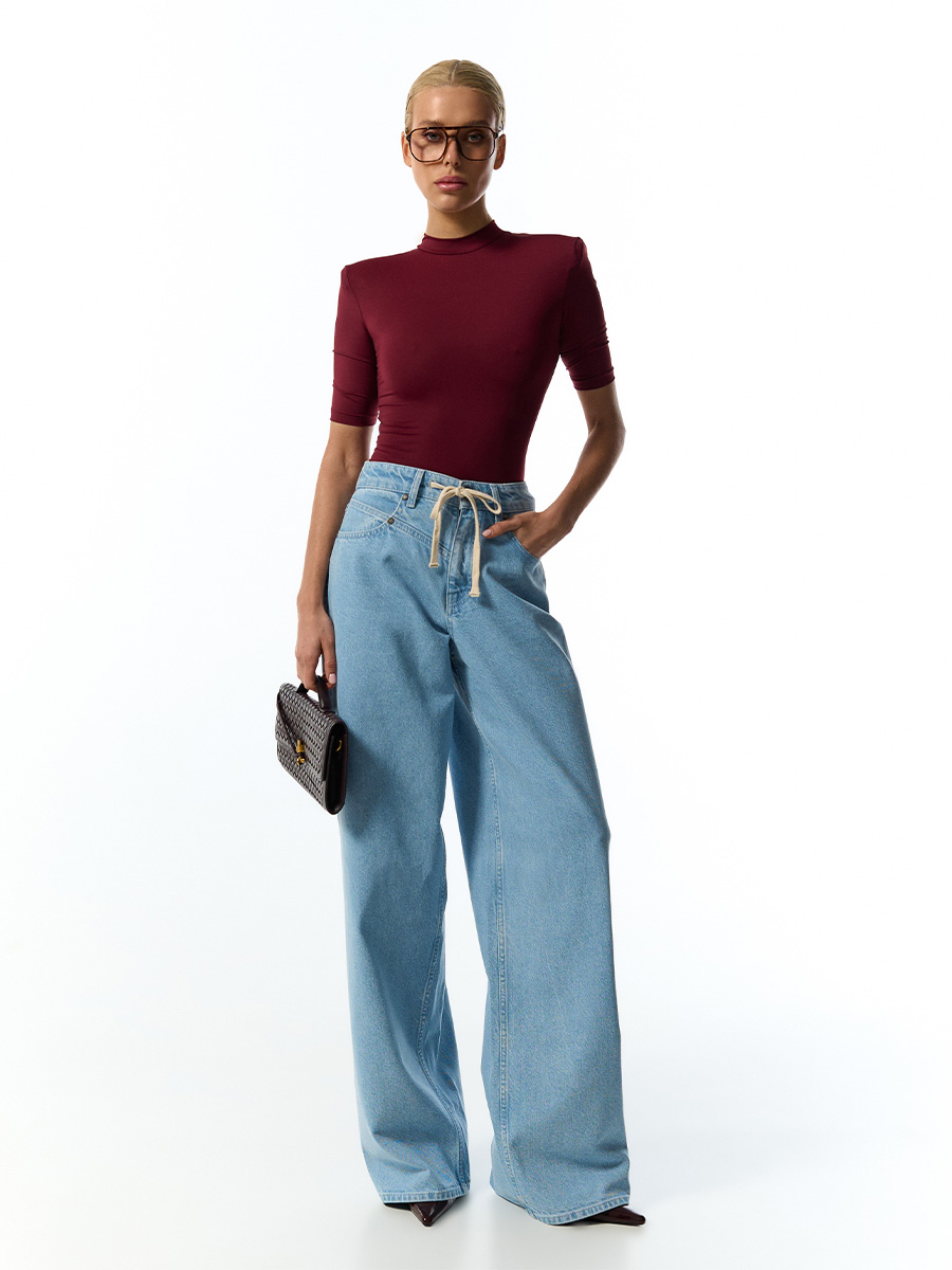 Джинси широкі блакитного кольору зі шнурком 1