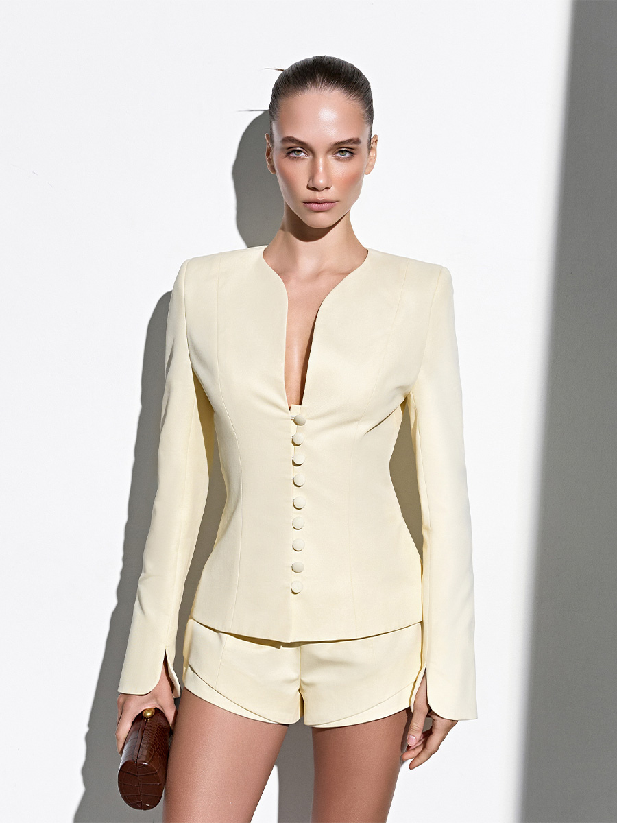 Шорти подвійні світло-жовтого кольору від комплекта з жакетом 1