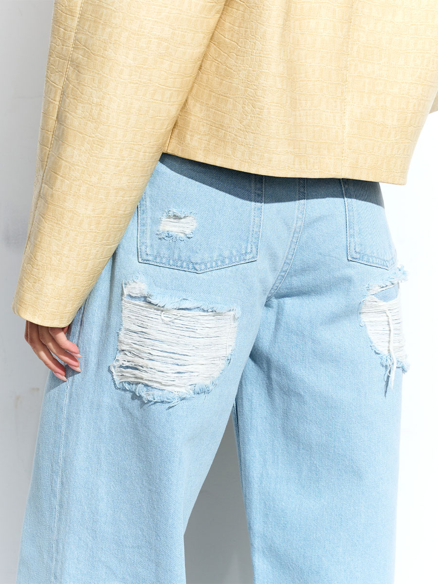 Джинси прямого крою блакитного кольору з потертостями сзаду 1