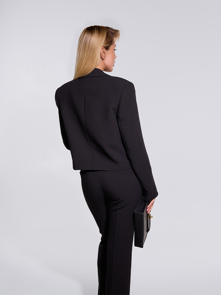 Штани клешені чорного кольору зі стрілками 1