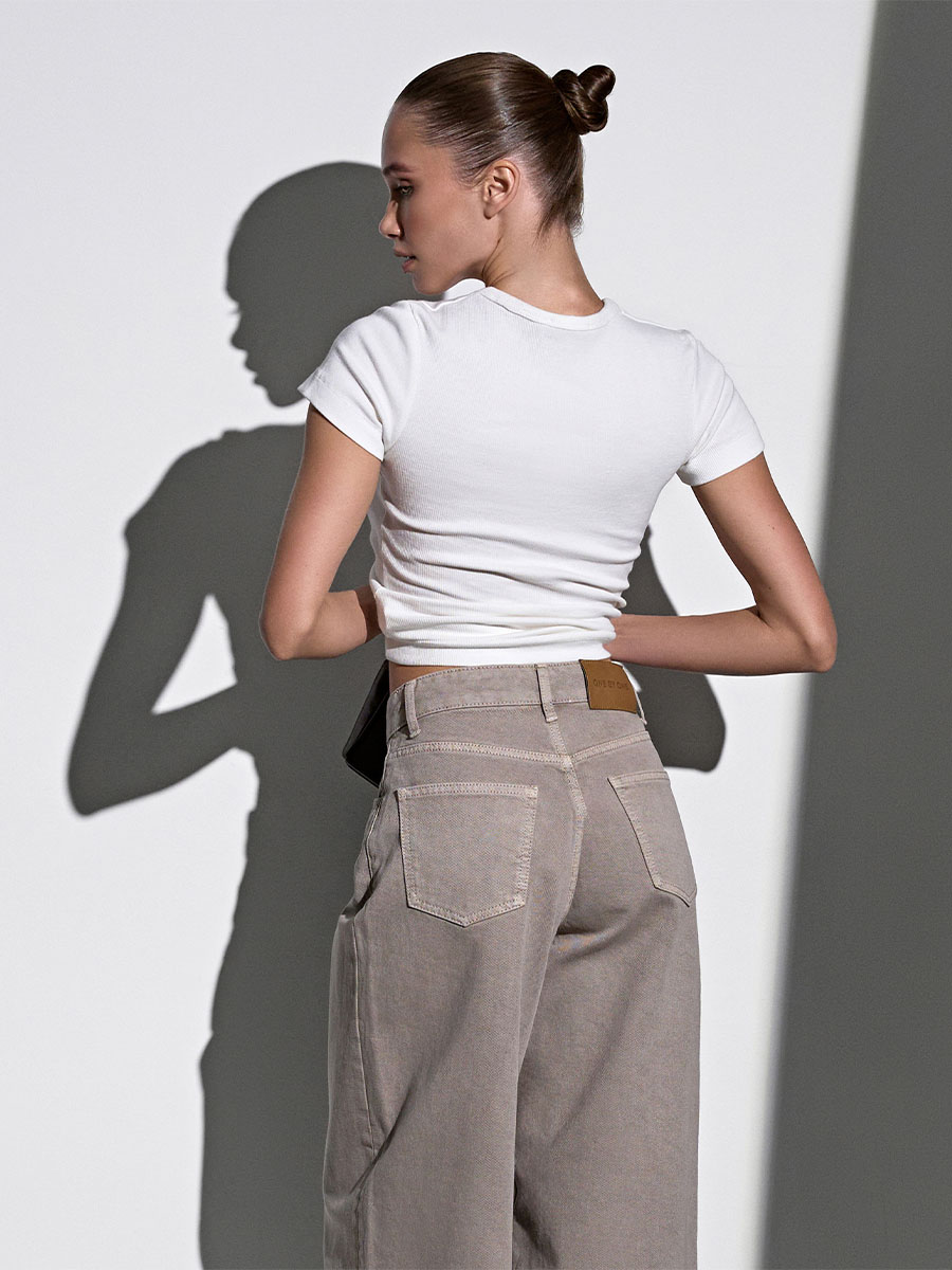 Джинси широкі бежевого кольору зі шнурком 1