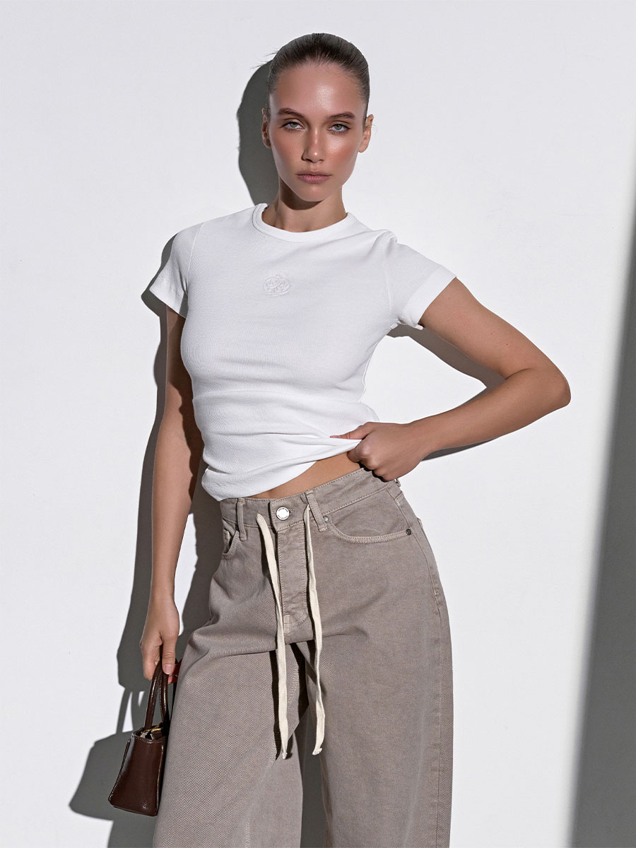 Джинси широкі бежевого кольору зі шнурком 1