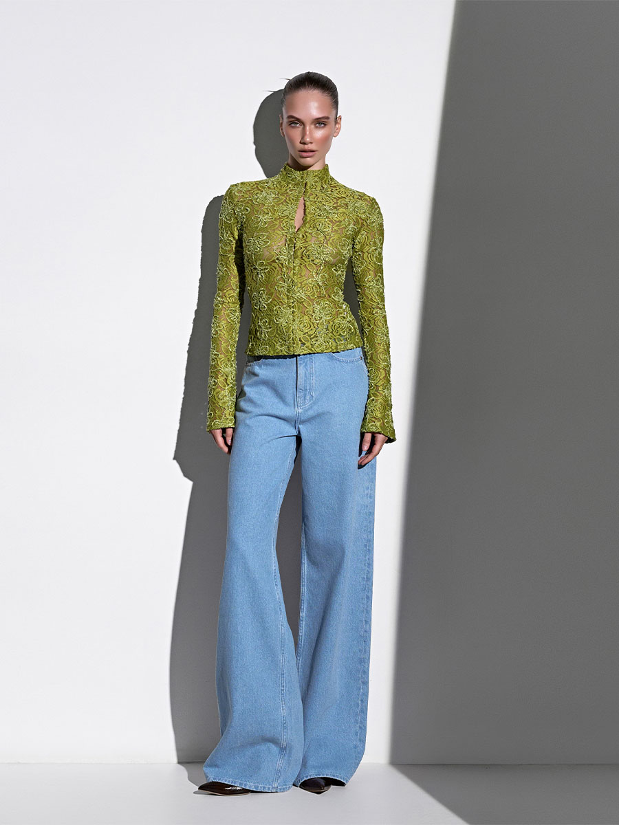 Лонгслів зеленого кольору із застібкою гачки 1