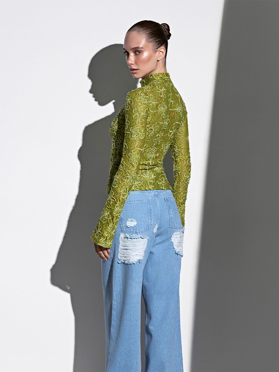 Лонгслів зеленого кольору із застібкою гачки 1