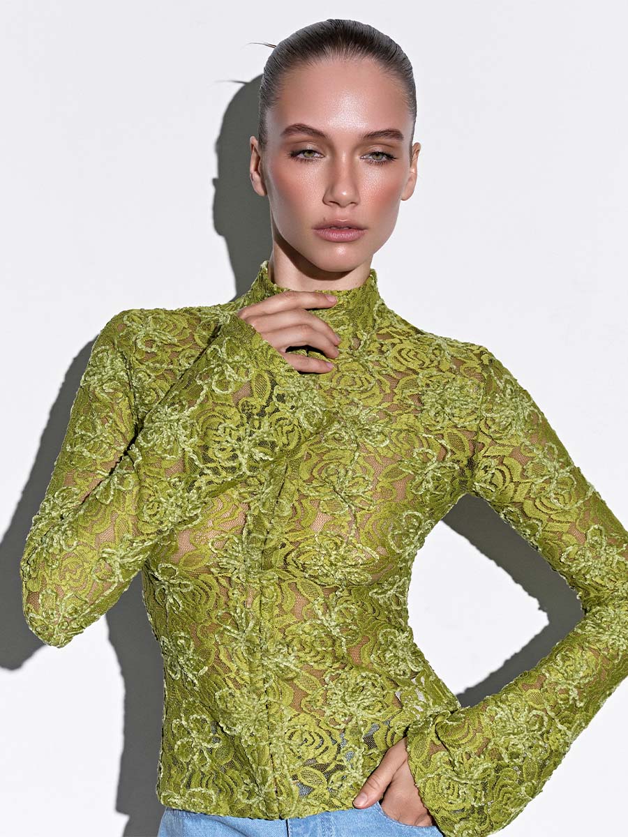 Лонгслів зеленого кольору із застібкою гачки 1