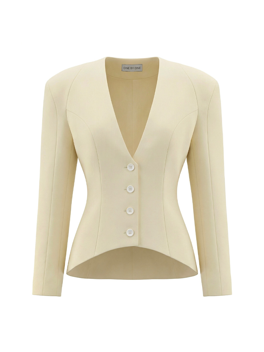 Жакет без коміра світло-жовтого кольору з об'ємним рукавом