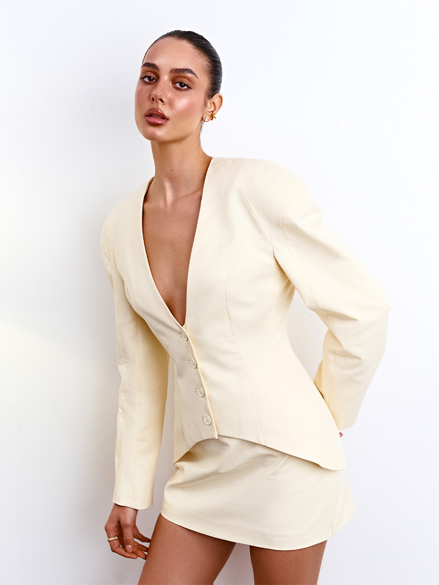 Жакет без коміра світло-жовтого кольору з об'ємним рукавом 1