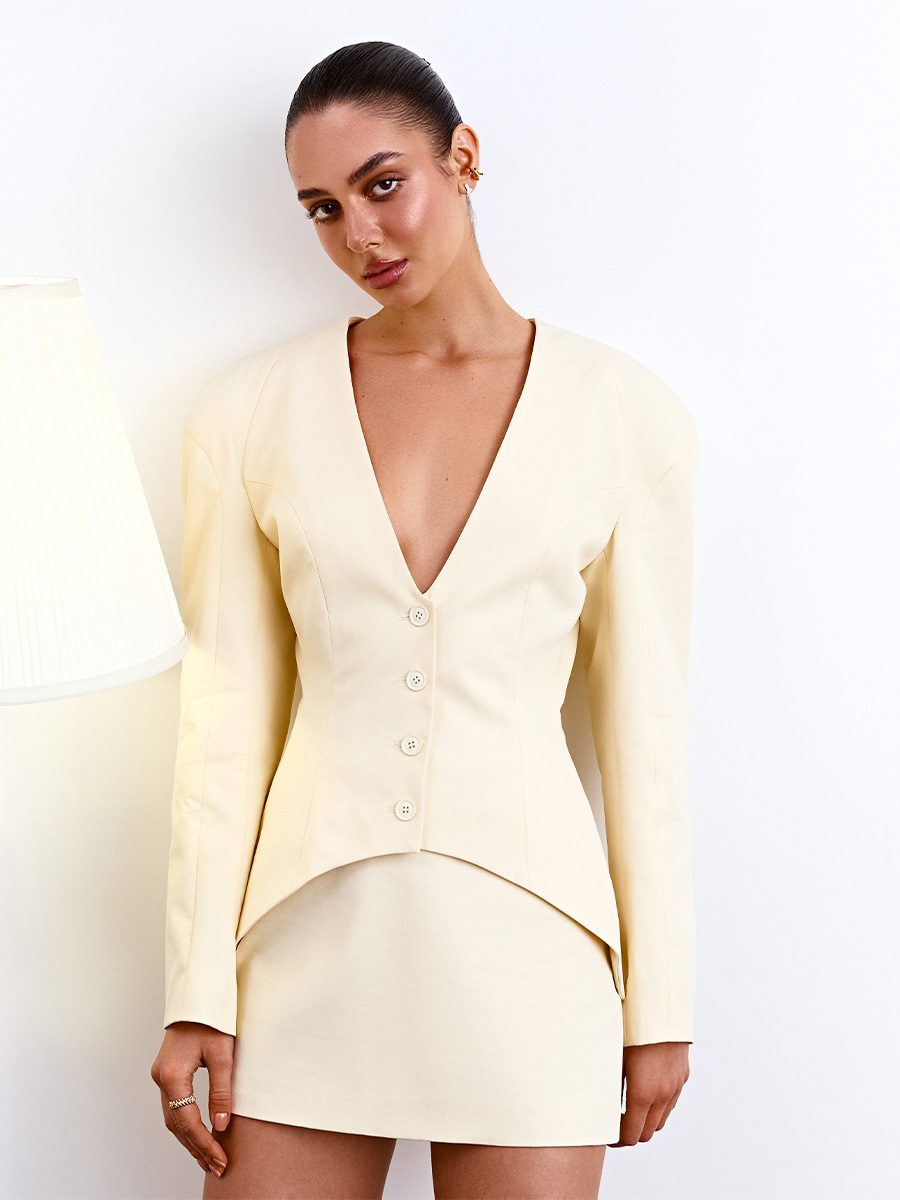 Жакет без коміра світло-жовтого кольору з об'ємним рукавом 1